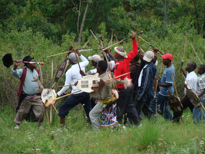 Young men engage in mock battle